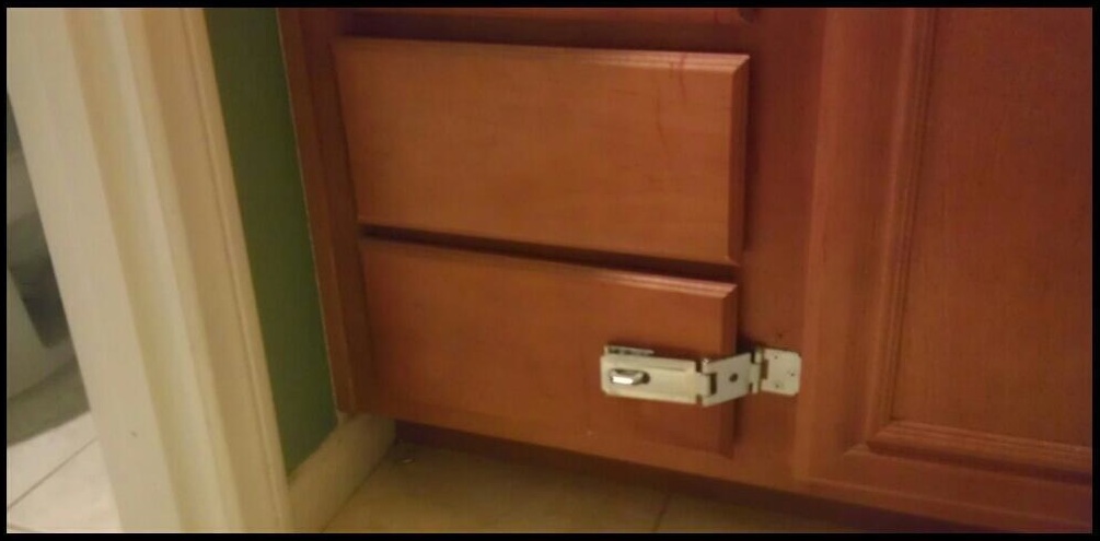 [latched drawer with drawer above closed]