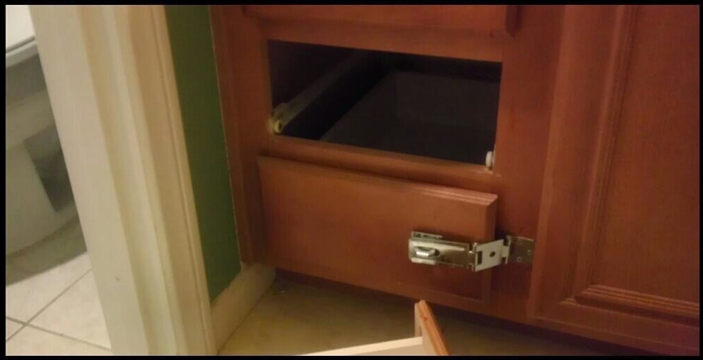 [latched drawer with drawer above removed]